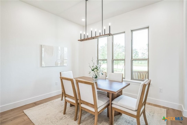 1586 Bosque Lago Dr, Belton, TX 76513 - dining space with baseboards and wood finished floors