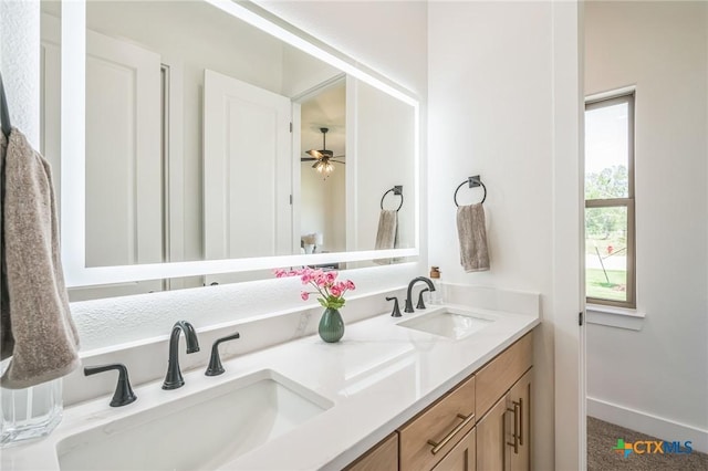 1586 Bosque Lago Dr, Belton, TX 76513 - full bath featuring double vanity, a ceiling fan, and baseboards