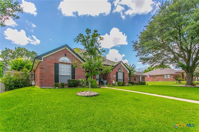 1306 Falcon Trl, Copperas Cove, TX 76522 - view of front of home with brick siding and a front yard