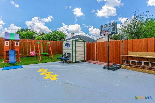 1306 Falcon Trl, Copperas Cove, TX 76522 - fenced backyard with a storage shed, a playground, and a patio area