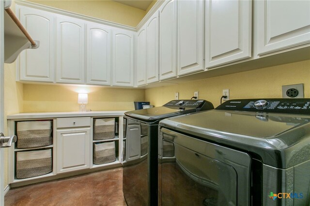 1306 Falcon Trl, Copperas Cove, TX 76522 - washroom with washer and clothes dryer and cabinet space