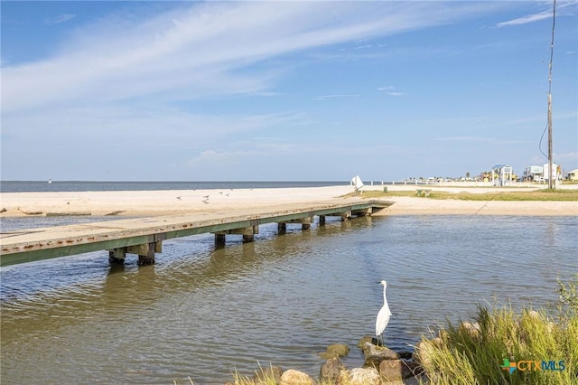 758 Margie Tewmey Rd, Port Lavaca, TX 77979 - dock area featuring view of water and beach