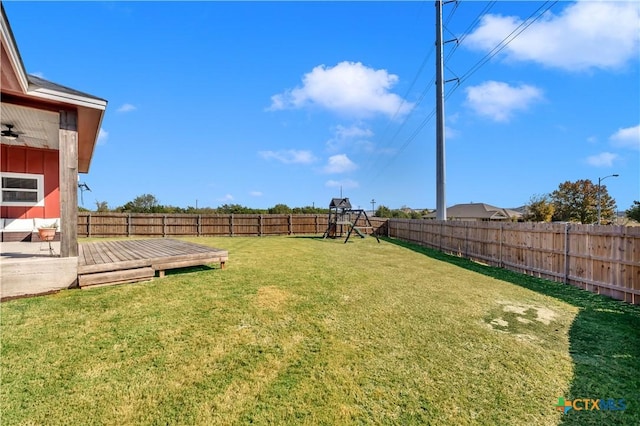 view of yard featuring a wooden deck