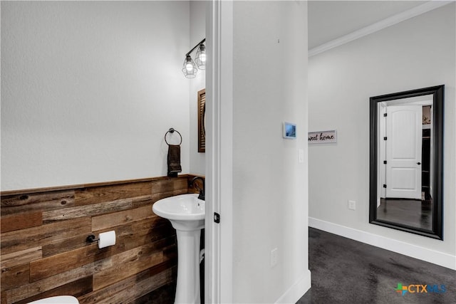 bathroom with crown molding