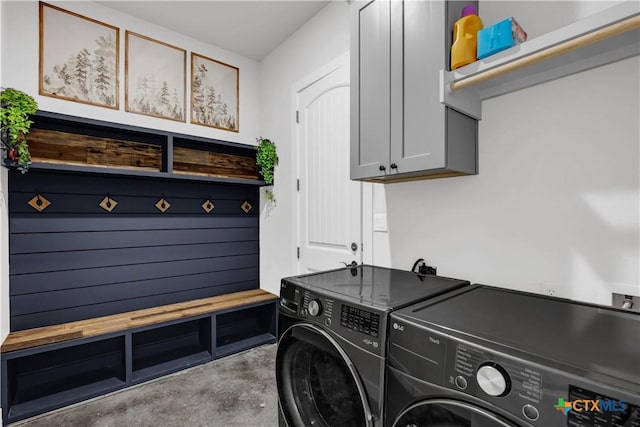 laundry area featuring cabinets and independent washer and dryer