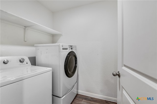 225 Rainey Dr Unit 73A, Jarrell, TX 76537 - laundry area with washer and clothes dryer, dark wood-type flooring, and baseboards