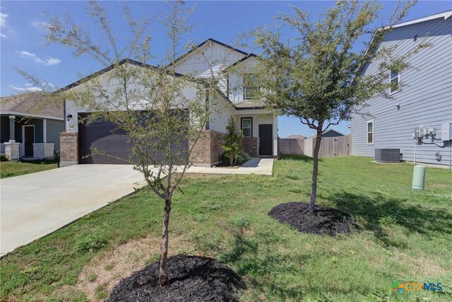 2420 Dielman Dr, Seguin, TX 78155 - view of front of property featuring central air condition unit, a garage, and driveway