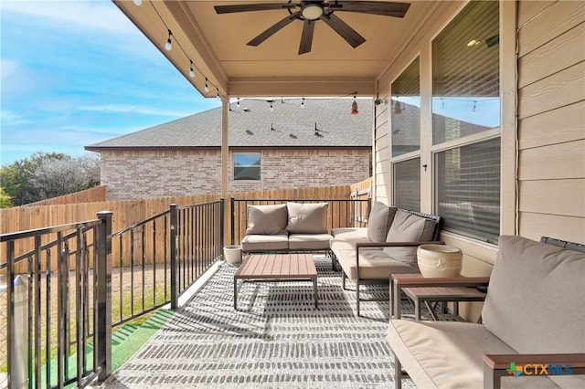 view of patio / terrace with an outdoor hangout area, ceiling fan, and fence