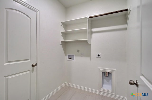 washroom with gas dryer hookup, hookup for a washing machine, and hookup for an electric dryer