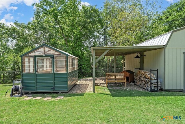 4130 Cripple Creek Dr, Temple, TX 76502 - exterior space with an outdoor structure, an exterior structure, and fence