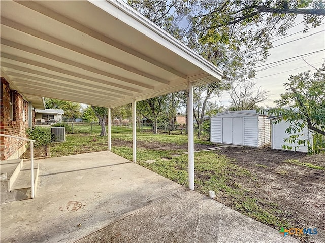 view of patio / terrace featuring a storage unit