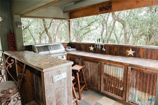211 Cambridge Dr, New Braunfels, TX 78132 - view of patio / terrace with a grill, a bar, and exterior kitchen