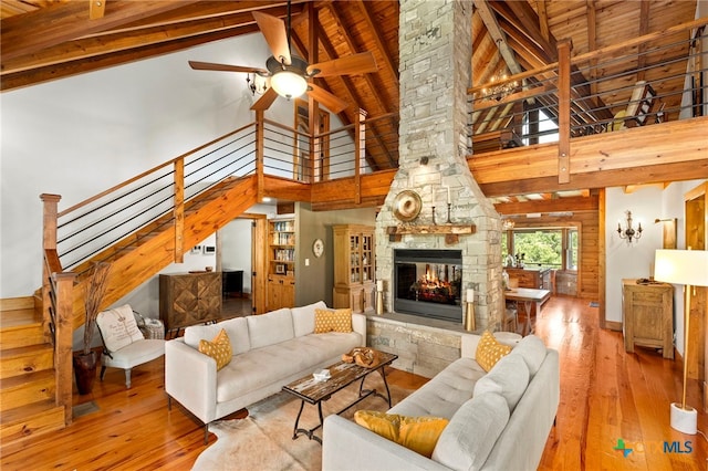 332 Westin Hls, New Braunfels, TX 78132 - living room featuring stairway, high vaulted ceiling, wood-type flooring, wood ceiling with exposed beams, and a ceiling fan
