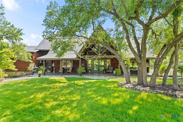 332 Westin Hls, New Braunfels, TX 78132 - back of property featuring a shingled roof, a lawn, log siding, and french doors