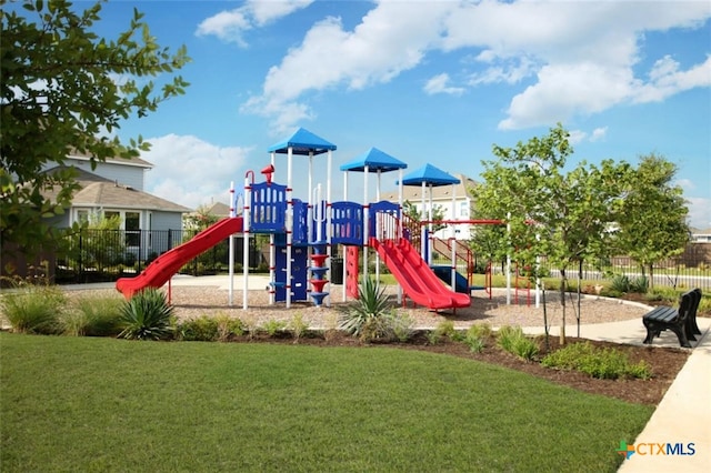 view of play area featuring a lawn