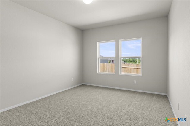 view of carpeted spare room