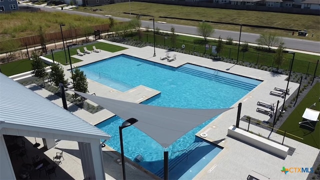 view of swimming pool featuring a patio