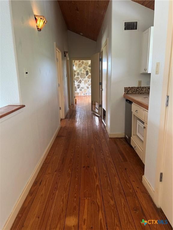 184 Guadalupe Hills Ln, Seguin, TX 78155 - corridor featuring lofted ceiling, dark wood-style floors, and wood ceiling