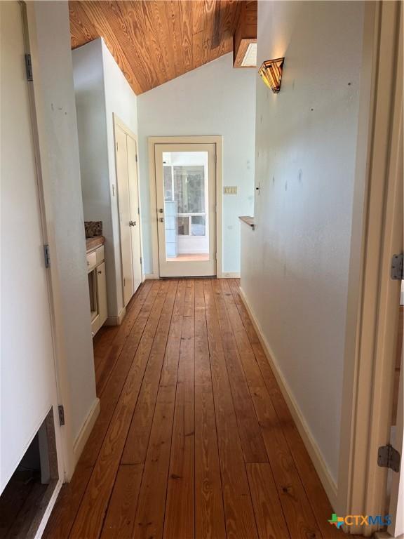 184 Guadalupe Hills Ln, Seguin, TX 78155 - hallway with wood ceiling, wood-type flooring, and lofted ceiling