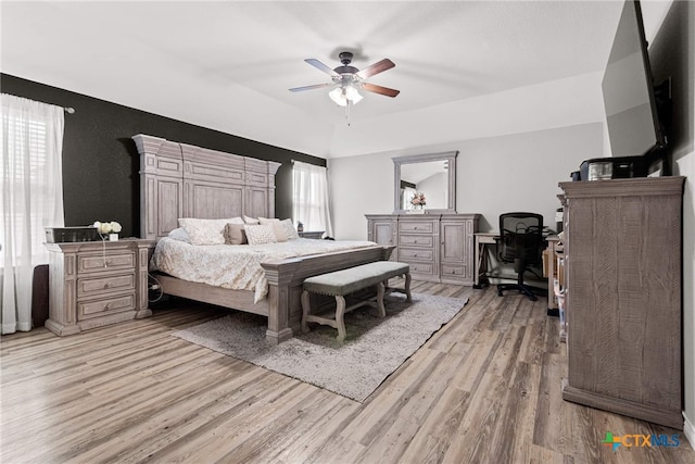 bedroom featuring light hardwood / wood-style flooring and ceiling fan