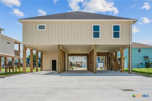 exterior space featuring a carport