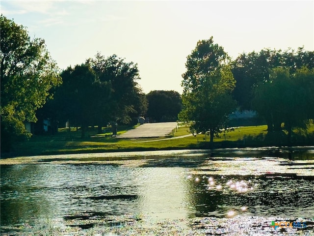 view of property's community with a water view