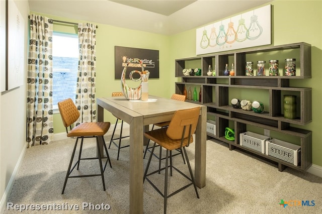 164 Linnet Ln, Maxwell, TX 78656 - dining area featuring carpet flooring and baseboards