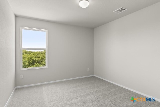 164 Linnet Ln, Maxwell, TX 78656 - carpeted spare room featuring baseboards