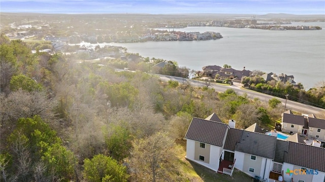 drone / aerial view featuring a water view