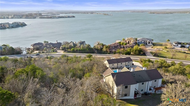 drone / aerial view featuring a water view