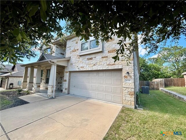 4208 Brookhaven Dr, Temple, TX 76504 - view of front of home with stone siding, driveway, a garage, and a porch