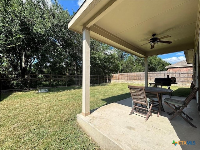 4208 Brookhaven Dr, Temple, TX 76504 - fenced backyard featuring ceiling fan and a patio area