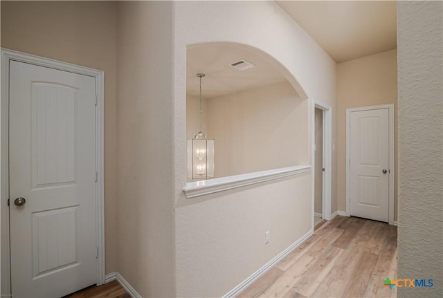 4208 Brookhaven Dr, Temple, TX 76504 - corridor featuring wood finished floors and arched walkways