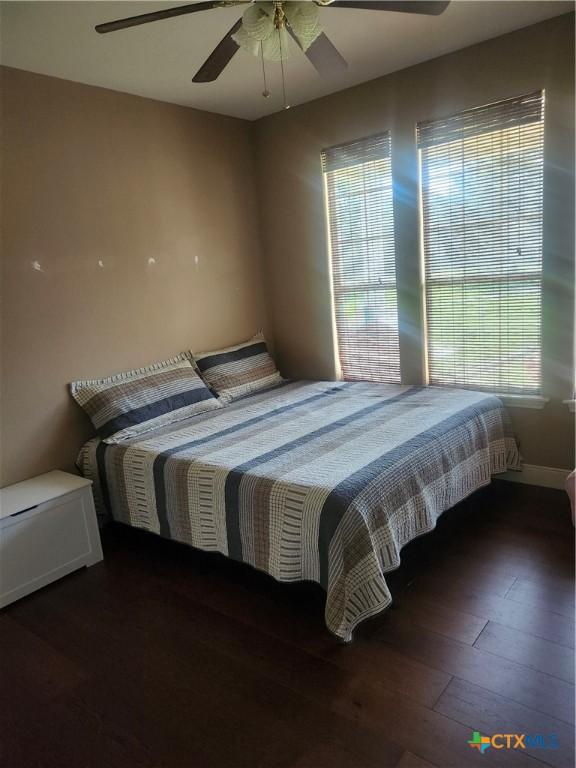 56 Post Oak Jct, Inez, TX 77968 - bedroom featuring wood-type flooring and a ceiling fan