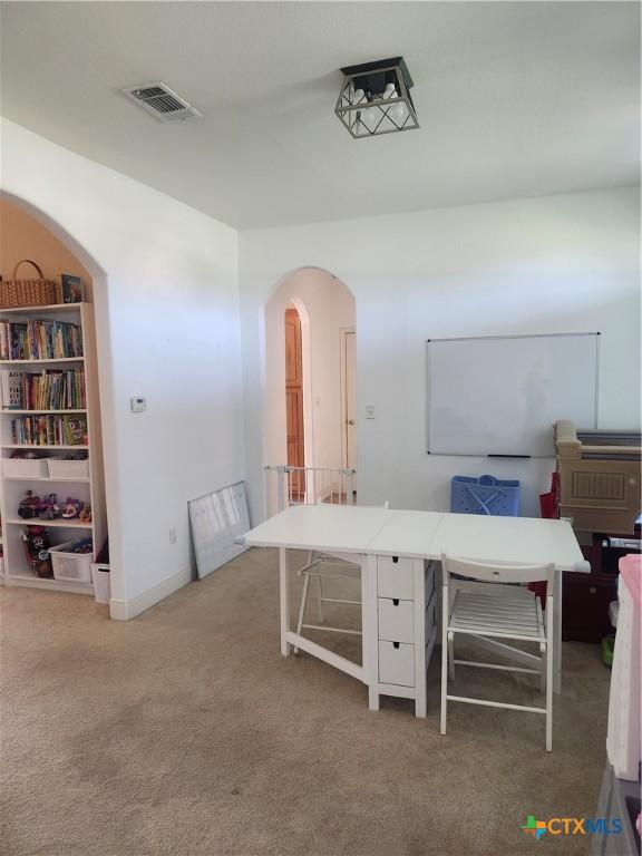 56 Post Oak Jct, Inez, TX 77968 - office with arched walkways and carpet flooring