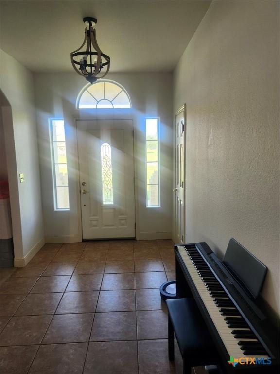 56 Post Oak Jct, Inez, TX 77968 - entryway with tile patterned flooring and baseboards
