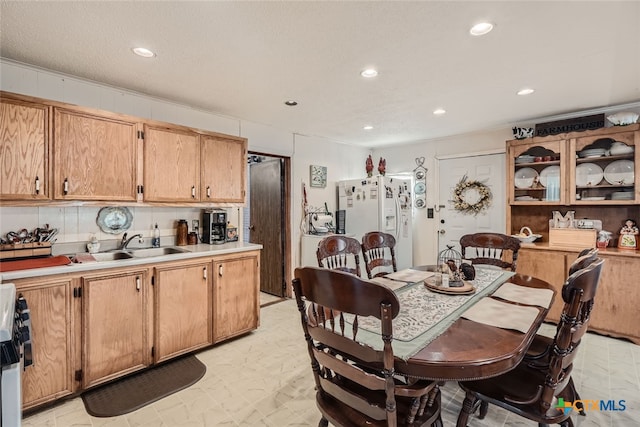 dining space with sink