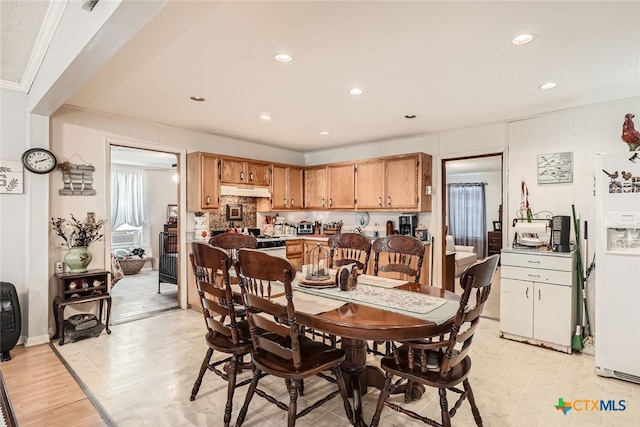 dining area with light hardwood / wood-style flooring