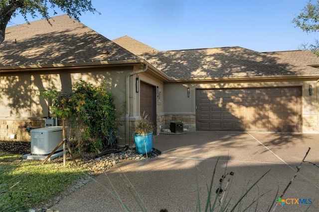 ranch-style home with a garage