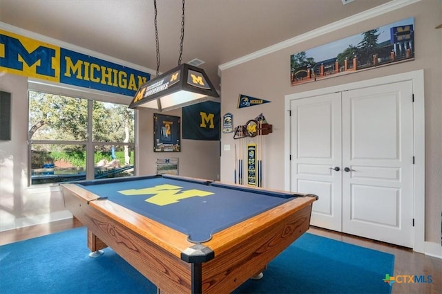 rec room with wood-type flooring, pool table, and ornamental molding