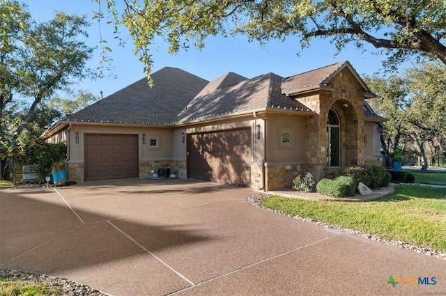 view of front of property featuring a garage