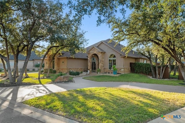 view of front of home with a front lawn