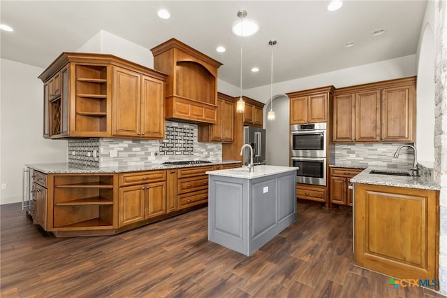 1607 Filtro, New Braunfels, TX 78132 - kitchen featuring open shelves, stainless steel appliances, brown cabinetry, backsplash, and recessed lighting