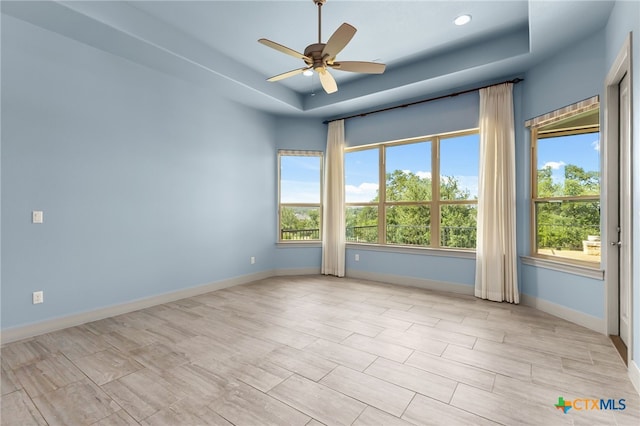1607 Filtro, New Braunfels, TX 78132 - spare room with a raised ceiling and ceiling fan