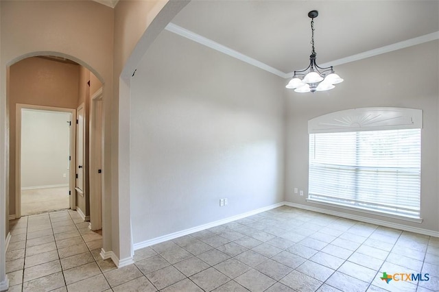 4901 Hammerstone Trl, Killeen, TX 76542 - empty room with arched walkways, light tile patterned flooring, ornamental molding, a chandelier, and baseboards
