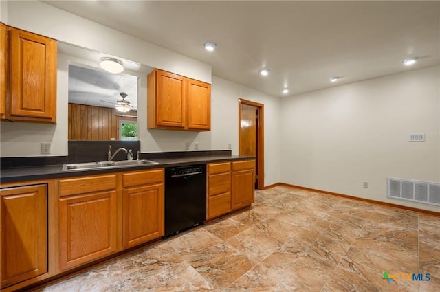 201 Hillcrest Dr, Luling, TX 78648 - kitchen featuring a sink, black dishwasher, dark countertops, brown cabinetry, and baseboards
