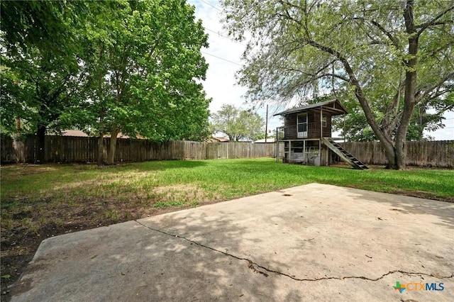 201 Hillcrest Dr, Luling, TX 78648 - view of yard featuring stairway and a patio area