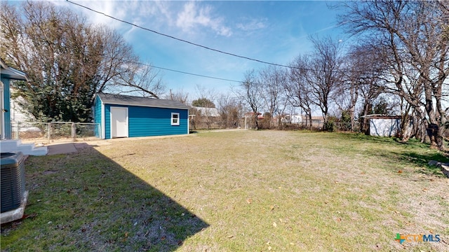 view of yard with a shed and central air condition unit