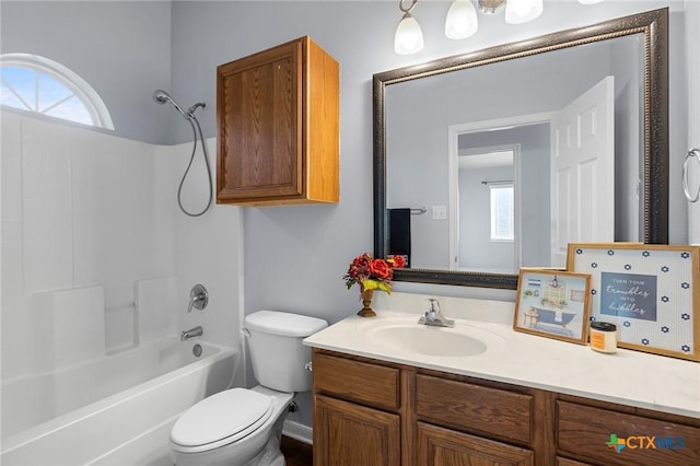 full bathroom with vanity, toilet, shower / bath combination, and a wealth of natural light