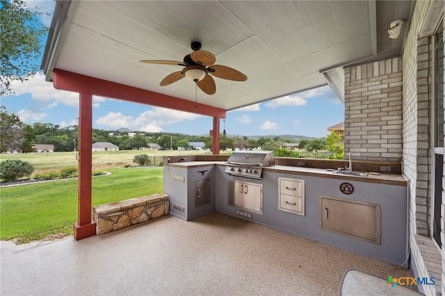 460 Shayla Ln, Canyon Lake, TX 78133 - view of patio / terrace featuring an outdoor kitchen and ceiling fan